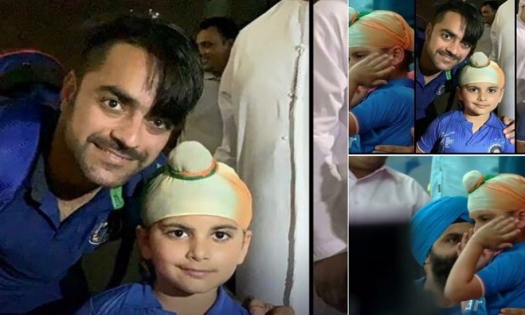 मैच के बाद राशिद खान ने इस रोते हुए बच्चे के साथ फोटो खिंचवाकर जीत लिया हर किसी का दिल Images