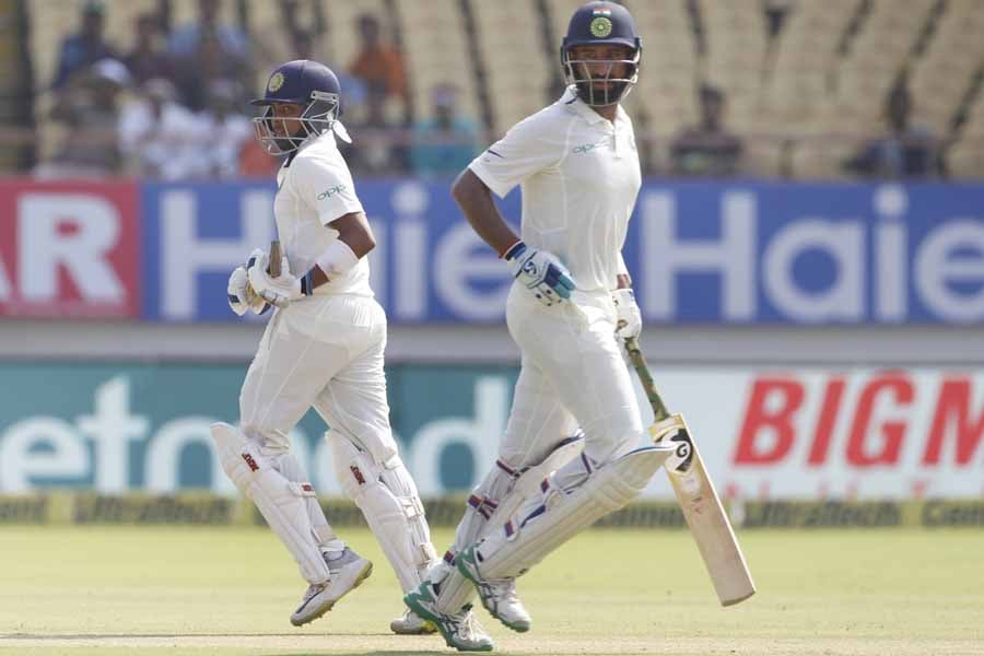 Rajkot Indias Cheteshwar Pujara And Prithvi Shaw Run Between The Wickets During The 1st Test Match I