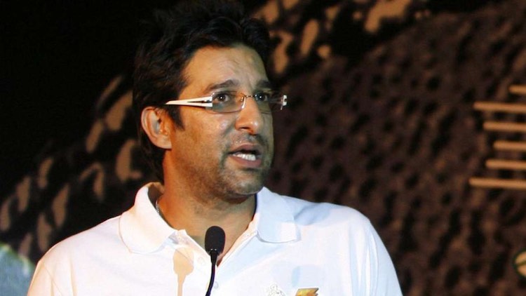 Manchester airport Wasim Akram
