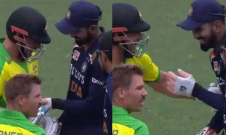 Australia vs India indian wicketkeeper KL Rahul shares a light moment with australian captain Aaron 