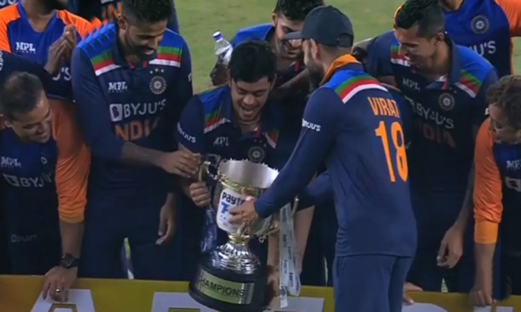 Cricket Image for Virat Kohli Gave The Trophy To Newcomer Ishan Kishan To Lift