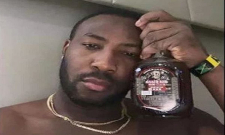 Cricket Image for IPL 2021: Andre Russell's Cryptic Message With Bottle In Hand