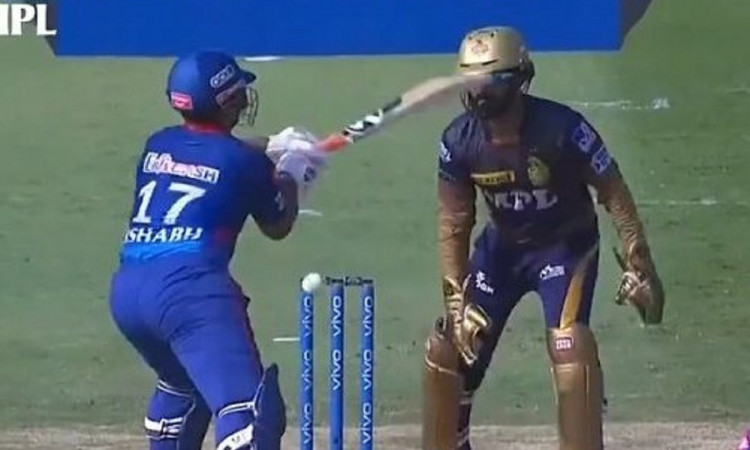 Dinesh Karthik had a close shave as Rishabh Pant tried to stop the ball from falling back on the stu