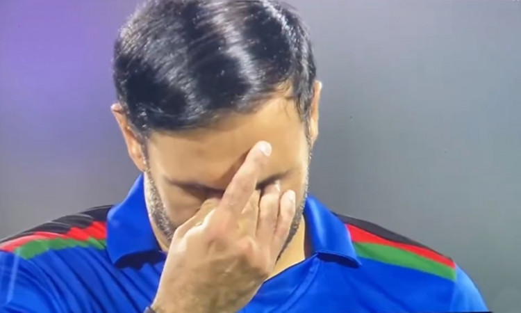 Cricket Image for VIDEO: रो पड़े मोहम्मद नबी, अफगान झंडे के साथ उतरी तालिबान के कब्जे वाली टीम 