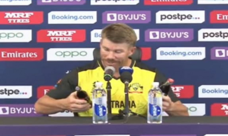 Warner mimics Ronaldo in removing Coca-Cola bottles from press conference