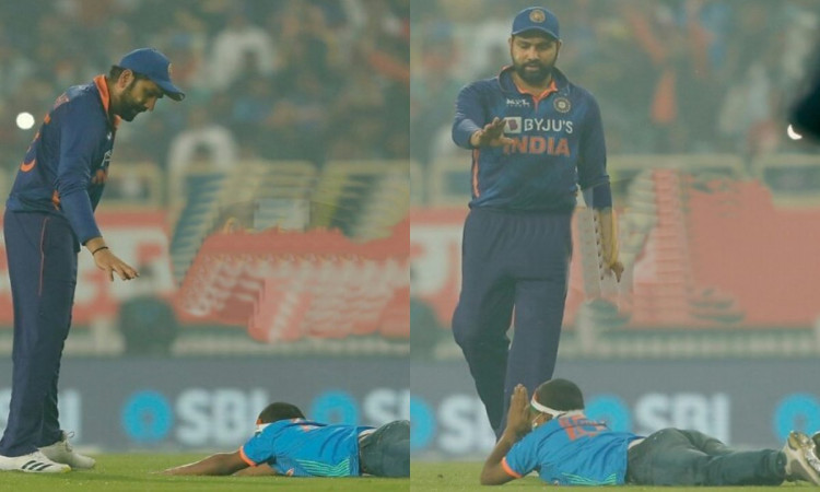 Cricket Image for Ind Vs Nz A Die Hard Fan Tries To Touch Rohit Sharma Feet Watch Video