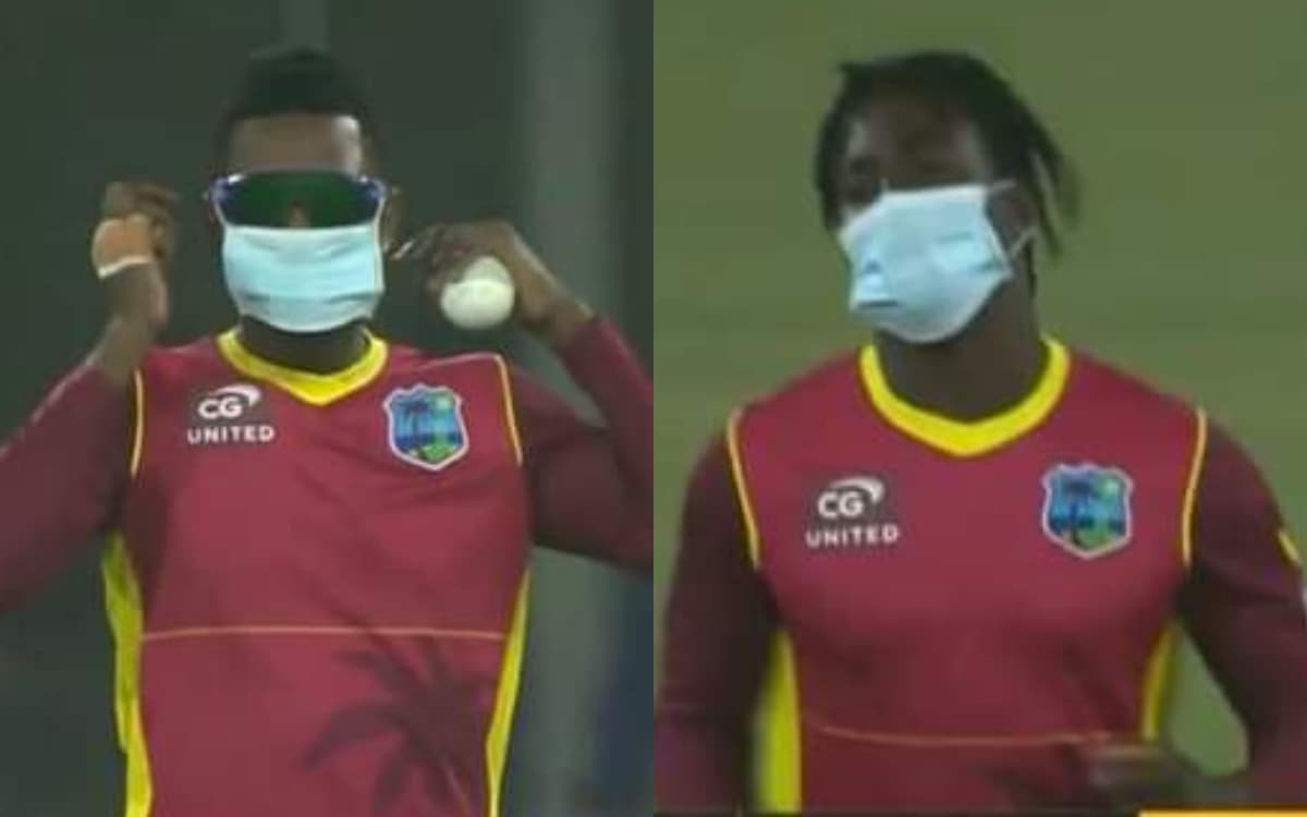 Cricket Image for LIVE मैच में दिखा गजब नजारा, मास्क पहनकर फील्डिंग करते हुए दिखे वेस्टइंडीज के खिला