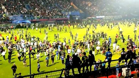 129 people killed after stampede at football match in Indonesia.