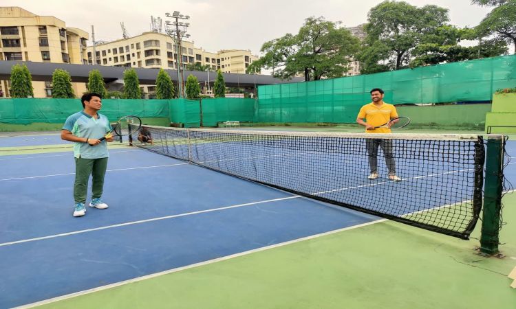 Sachin Tendulkar and MS Dhoni together doing an Ad shoot