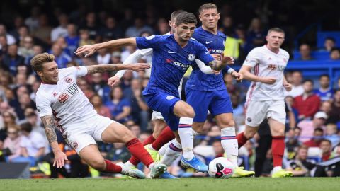 Al Khor:England's Jordan Henderson, tries to dribble between Christian Pulisic of the United States 