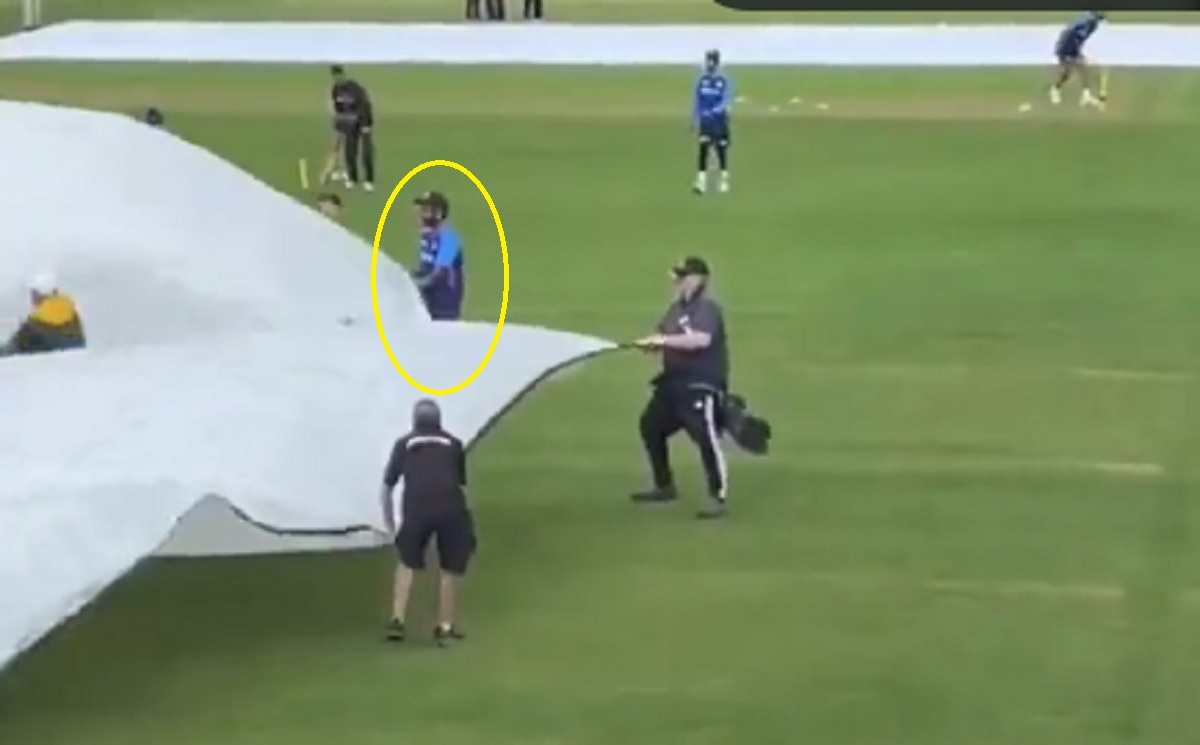Sanju Samson helping the ground staff during the rain break Sanju Samson helping the ground staff during the rain break