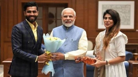 Cricketer Ravindrasinh Jadeja, his wife Rivaba with the Prime Minister Narendra Modi