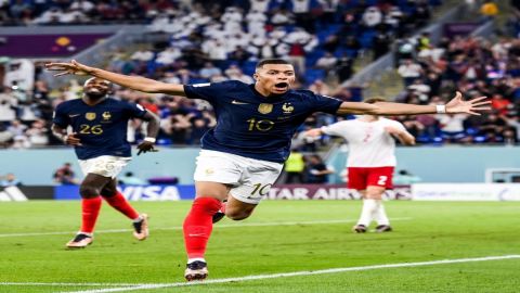 Deschamps praises 'leader' Mbappe after his two goals put France into WC last 16