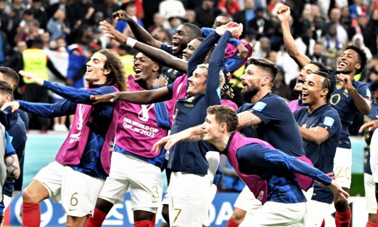 Al Khor : French players celebrate at the end of the World Cup quarter final football match between 