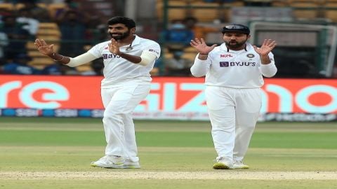 Bengaluru:India's Jasprit Bumrah,celebrates with team Captain Rohit Sharma after the dismissal of Sr