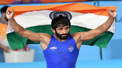 Birmingham: Indian wrestler Bajrang Punia celebrates after winning gold medal against Canada's McNei