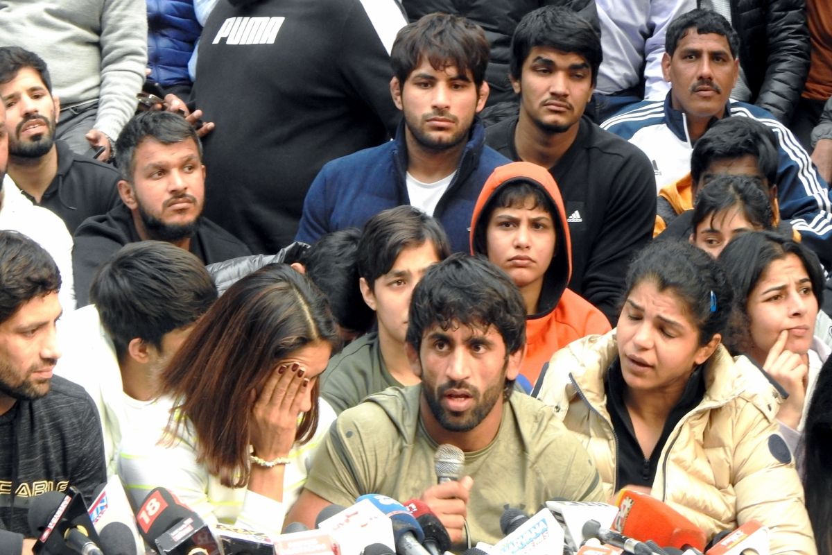Indian wrestlers Vinesh Phogat, Bajrang Punia with others address the media during a sile