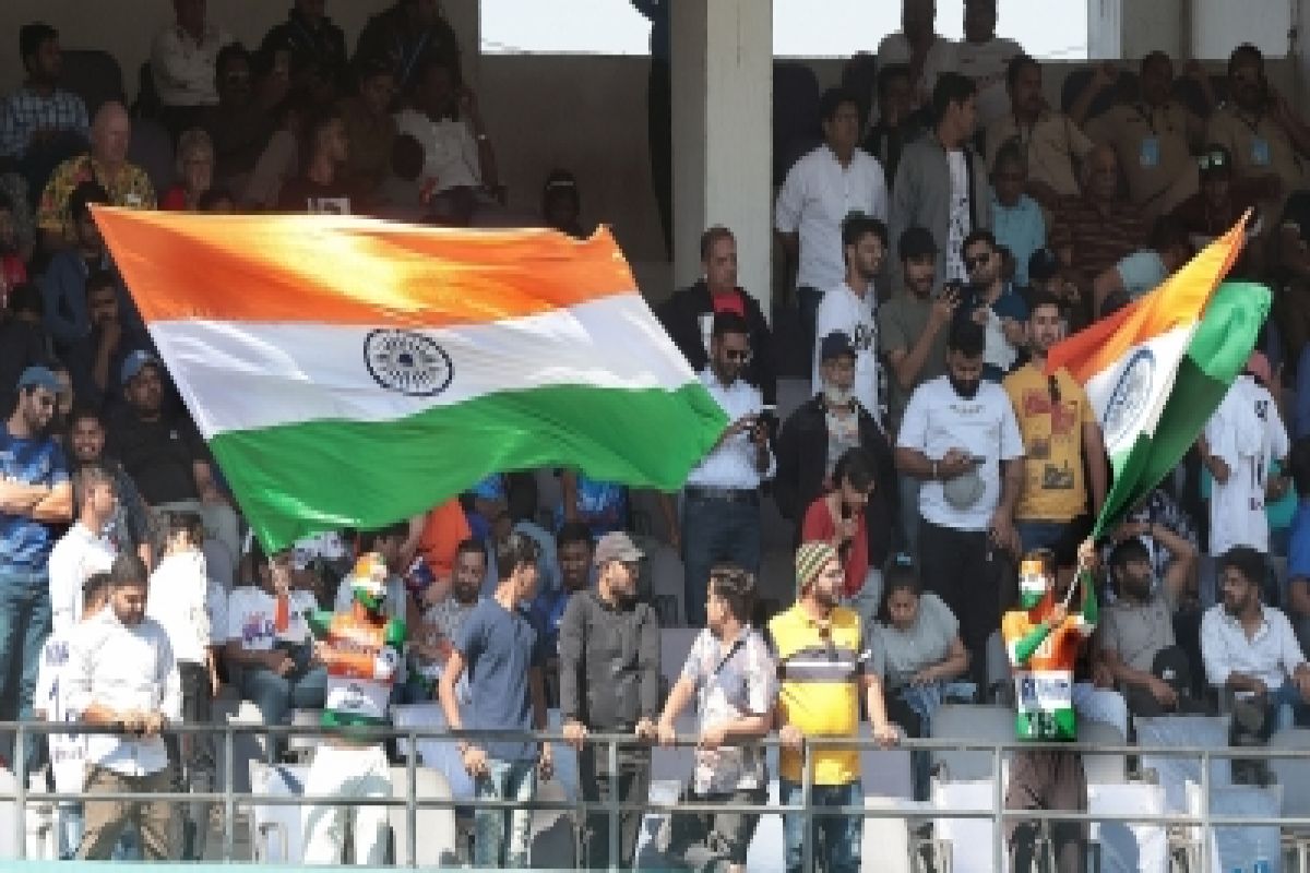 Nagpur :Indian fans celebrate during the first day of the first cricket test match between India and