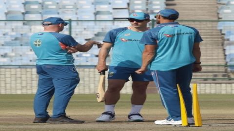 New Delhi: Australian captain Pat Cummins and Mitchell Starc discuss with a coaching staff during a 