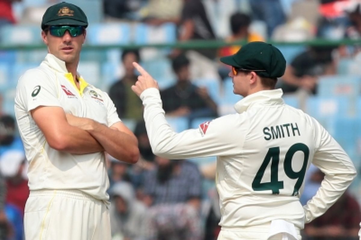 New Delhi : Australian skipper Pat Cummins and cricketer Steve Smith during the second day of the se