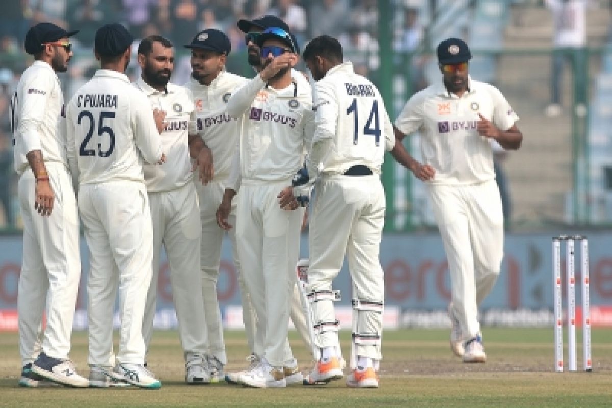 New Delhi : India's Mohammed Shami celebrates the dismissal of Australia's David Warner with teammat