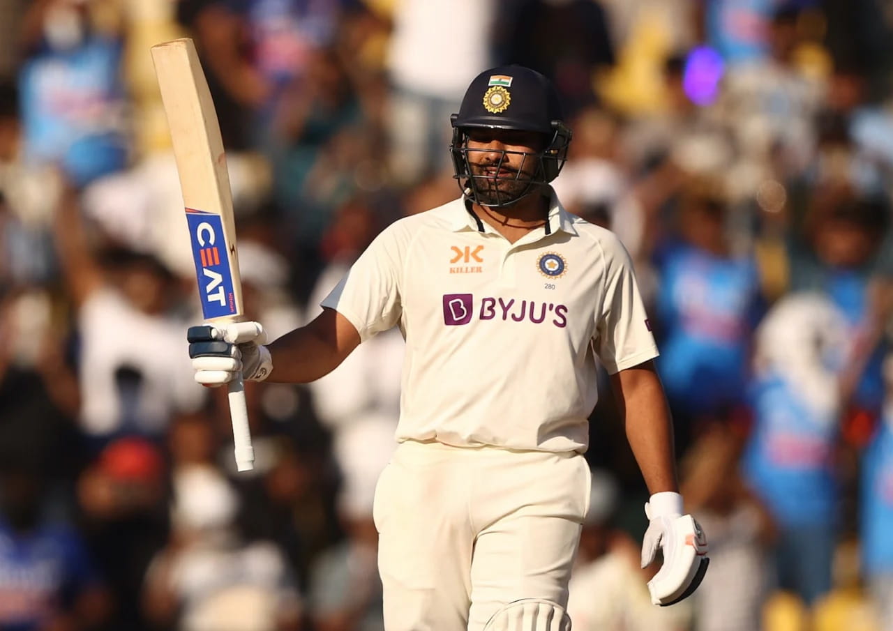 Nagpur: India's captain Rohit Sharma raises his bat to celebrate scoring a century during the second