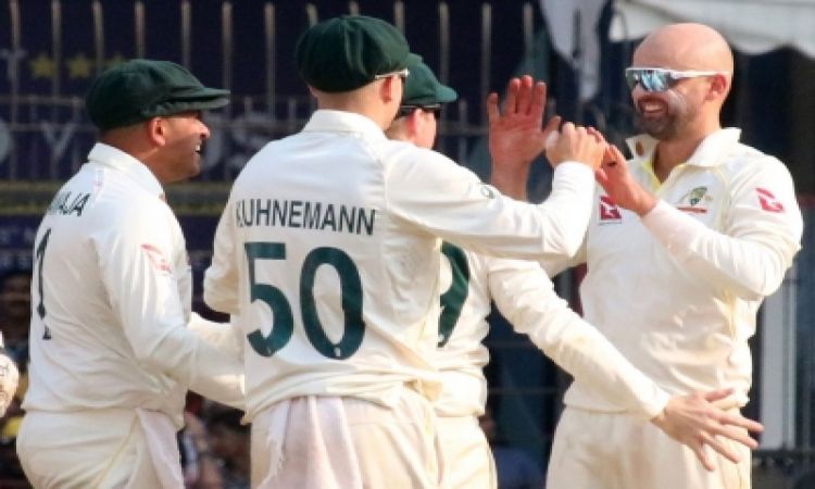 Indore: Australia's Nathan Lyon celebrate the dismissal of India's Cheteshwar Pujara with teammates 
