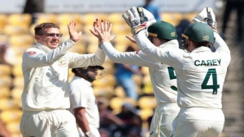 Nagpur: Australia's Todd Murphy celebrate the dismissal of India's Virat Kohli with Alex Carey durin