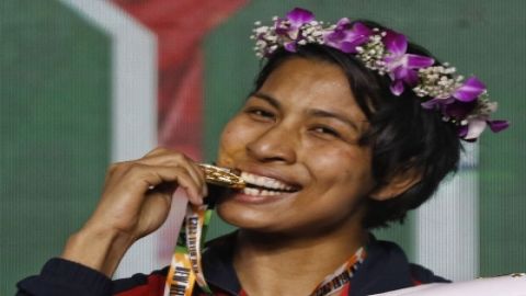 New Delhi: India's Lovlina Borgohain (Red) poses with Gold medal after winning