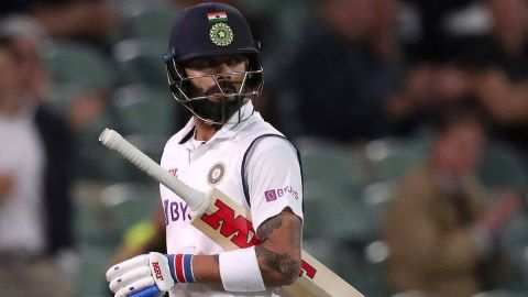 Ahmedabad : India's Virat Kohli raises his bat to acknowledge the crowd as he walks back to pavilion