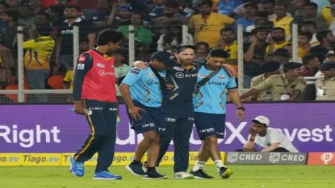 Ahmadabad : GT batter Kane Williamson leaves the ground after getting injured while fielding during 