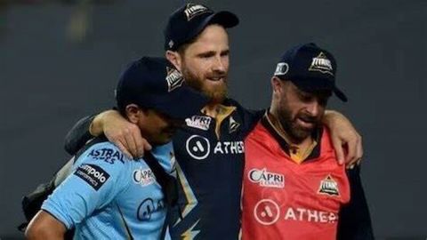 Ahmadabad : GT batter Kane Williamson leaves the ground after getting injured while fielding during 