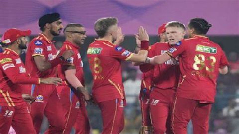 Guwahati: PBKS bowler Nathan Ellis celebrates after the dismissal of RR batter Jos Buttler during th