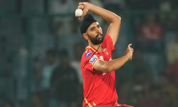bowler Harpreet Brar bowls during the IPL 2023 match between Punjab Kings and Delhi Capitals