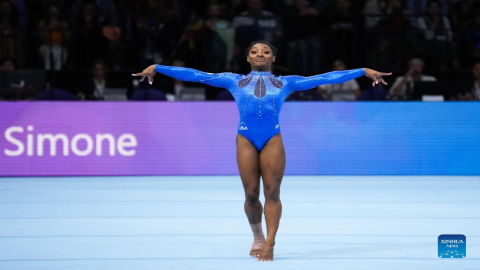 Biles wins historic gold to record sixth world all-around title