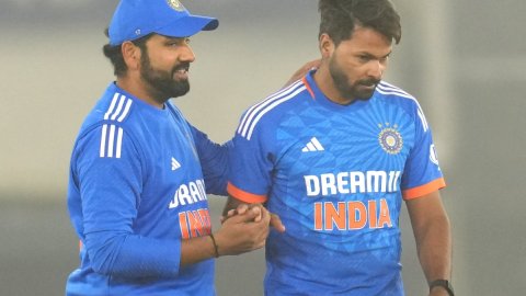 Mohali: India's Mukesh Kumar and Rohit Sharma celebrate the wicket of Afghanistan's Mohammad Nabi du