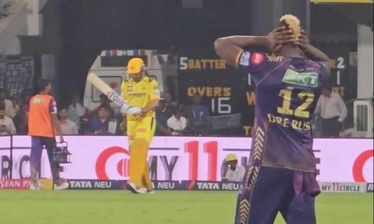 Andre Russell covers his ears as fans cause deafening noise upon MS Dhoni's entry