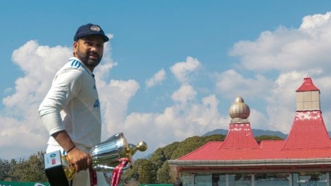 Dharamshala : Indian cricket team palyers pose with the winning trophy after they won the fifth test