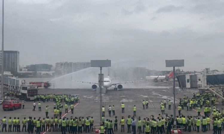 Team accorded 'water salute' after plane lands, Mumbai buzzing with chants of ‘India ka Raja Rohit S