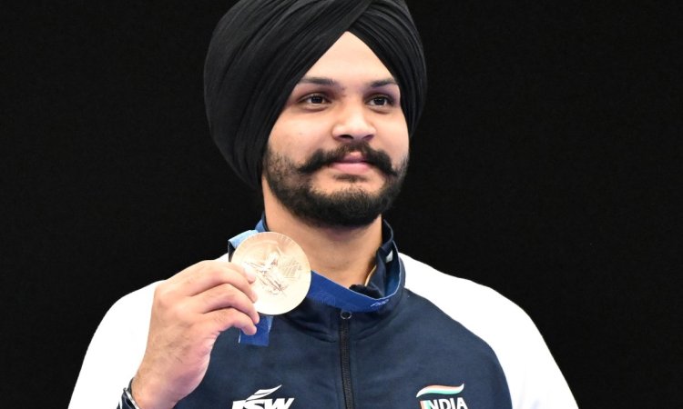 Chateauroux: India's Manu Bhaker and Sarabjot Singh celebrate after winning the bronze medal in the 