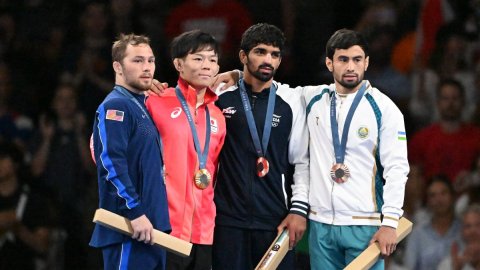 Paris : India's Aman Sehrawat poses with his bronze medal during the medal ceremony for men's freest