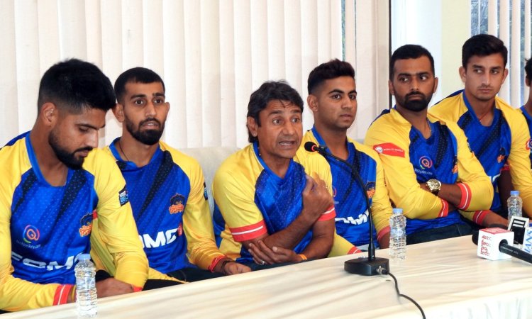 New Delhi: Purani Dilli 6 coach Vijay Dahiya with team players during a press conference