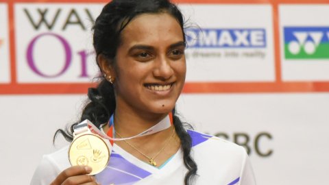 Lucknow: India's PV Sindhu poses with her medal after winning the final match against China's Wu Luo