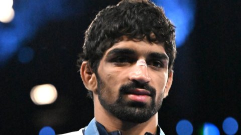 Paris : India's Aman Sehrawat poses with his bronze medal during the medal ceremony for men's freest