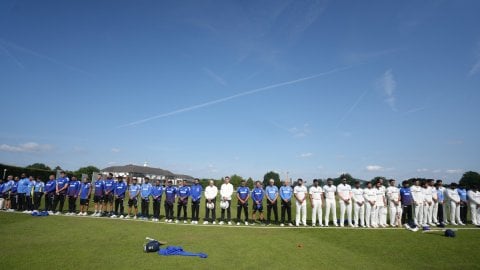 Players in England wear black armbands, observe a minute's silence in memory of Ahmedabad plane cras