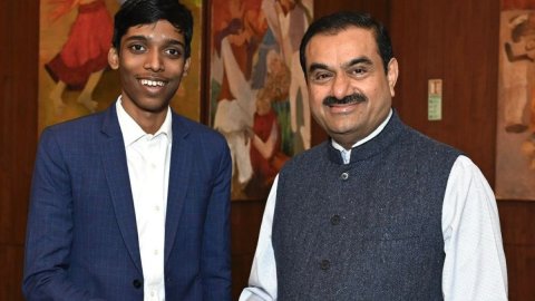New Delhi: Adani Group Chairperson Gautam Adani meets Indian chess grandmaster and 2023 FIDE World C