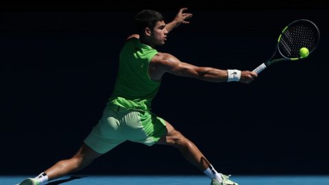 Alcaraz survives longest first set of his career at a major to move into Aus Open third round
