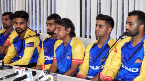 New Delhi: Purani Dilli 6 coach Vijay Dahiya with team players during a press conference