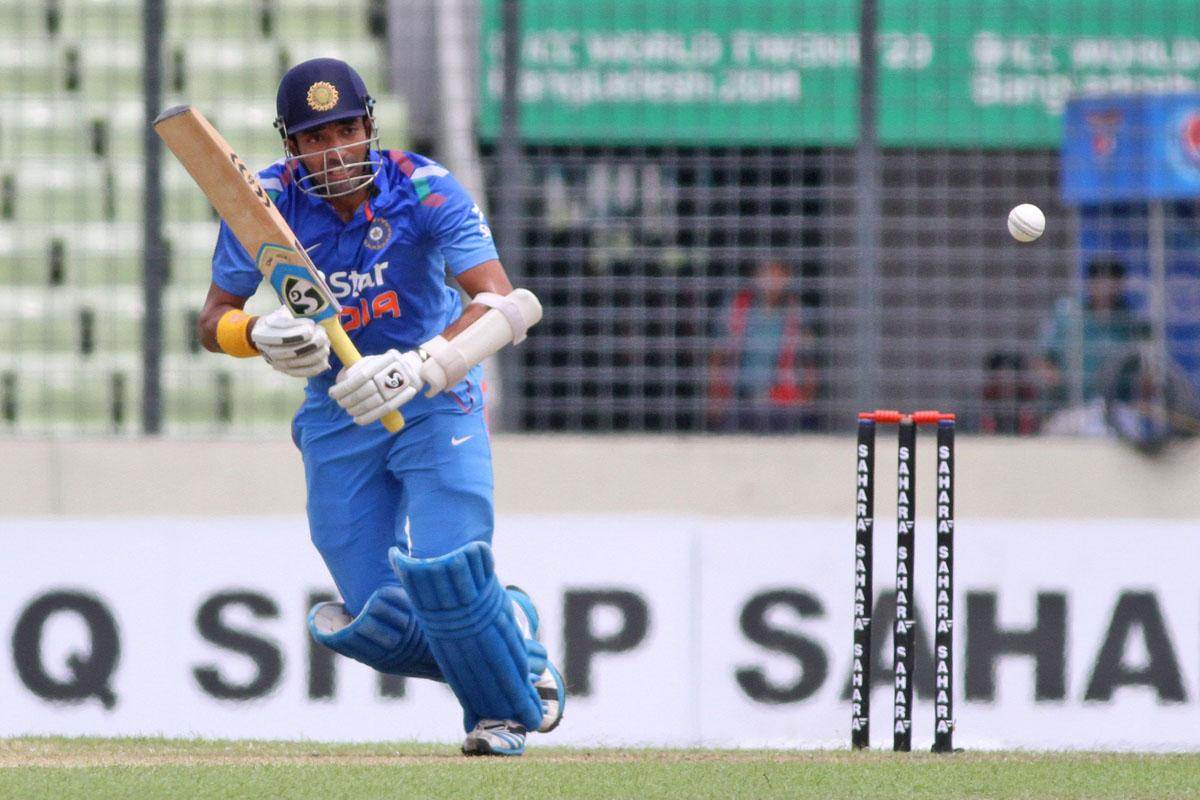 HD Image for cricket Robin Uthappa in action in Tamil