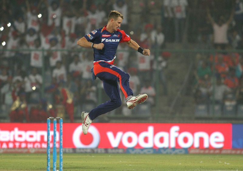 Christopher Morris of Delhi Daredevils celebrates fall of a wicket